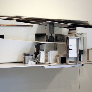 Photographs, foam core, cardboard, wood and miniature furniture built into large architectural -like model