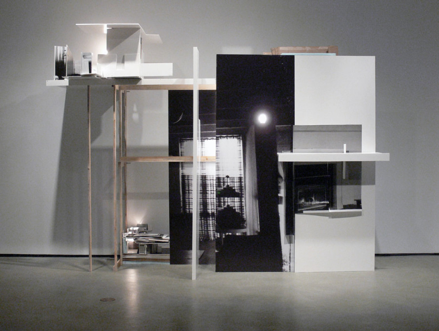 photographs mounted on foam core panels, wood, lights, and foam core